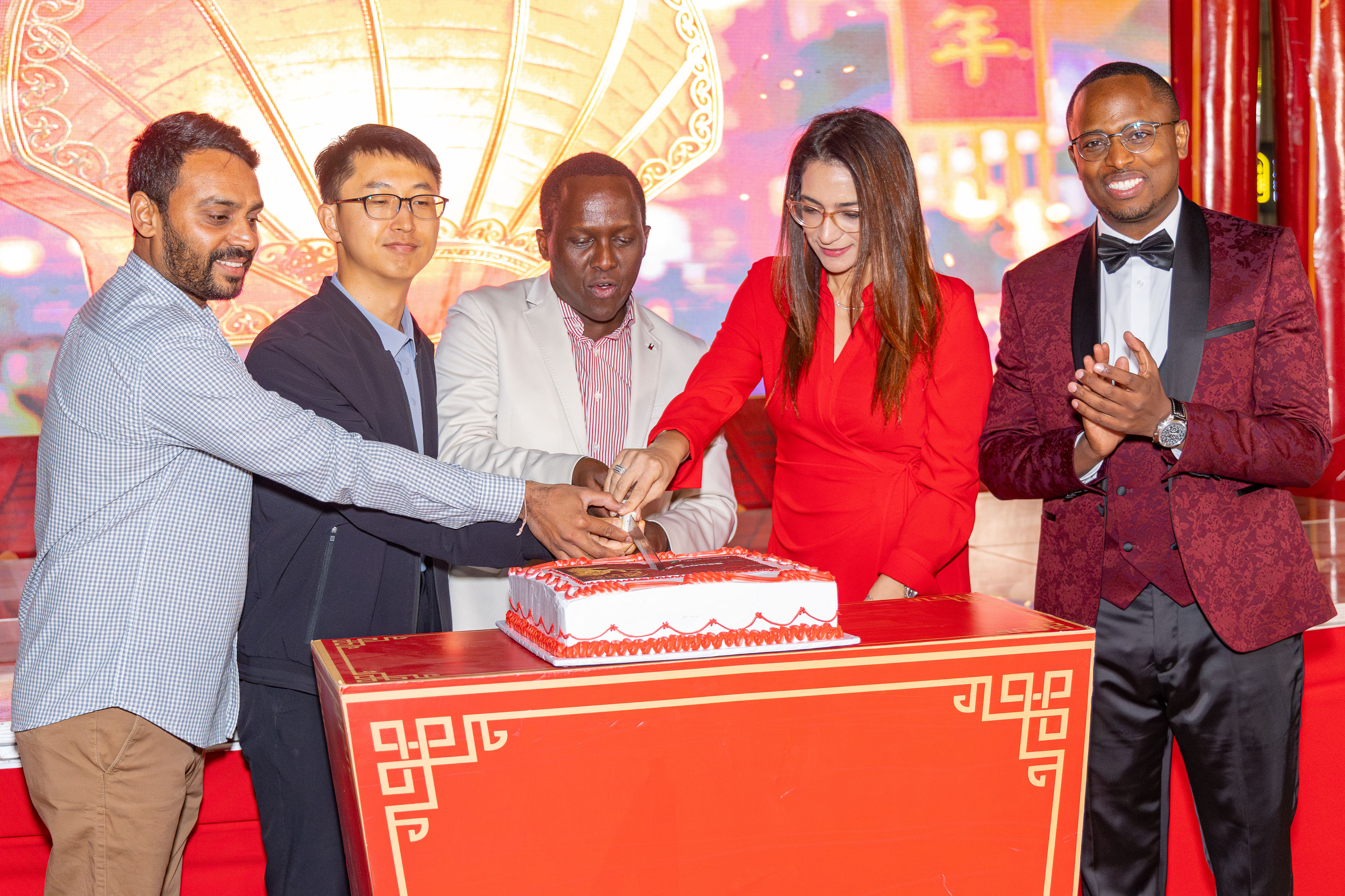 Representatives of Vivo Energy Kenya and the business community cut the cake as part of the Chinese New Year celebration.