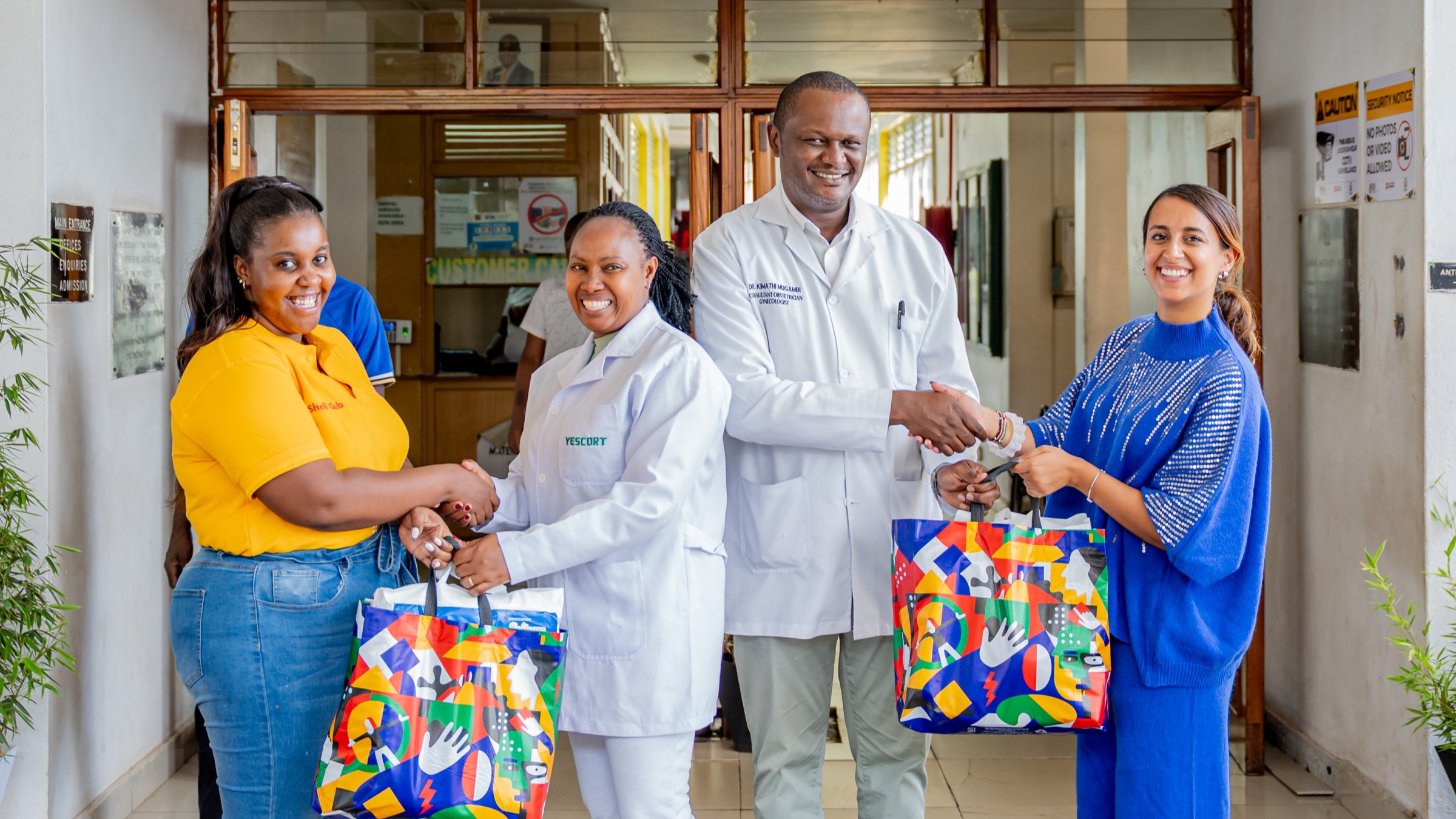 Representatives of Shell Club present gifts to representatives of the Pumwani Maternity Hospital